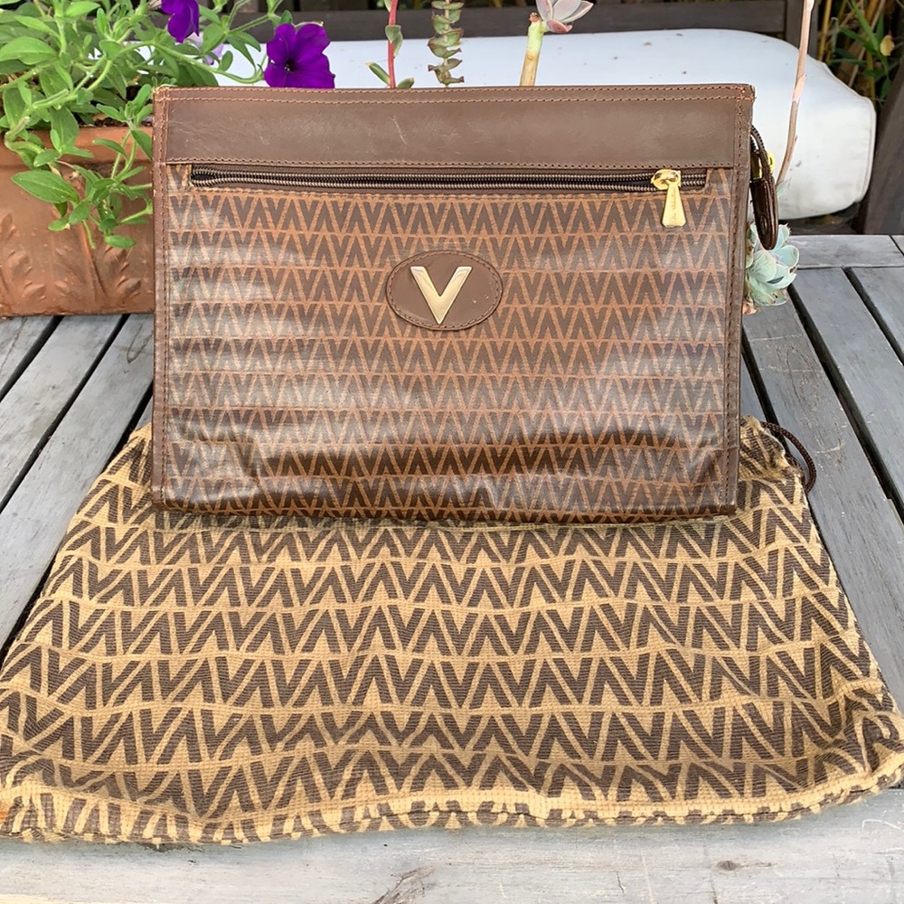 Mario Valentino zippered clutch w dust cover